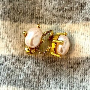 Freshwater pearl clip on gold tone earrings.
